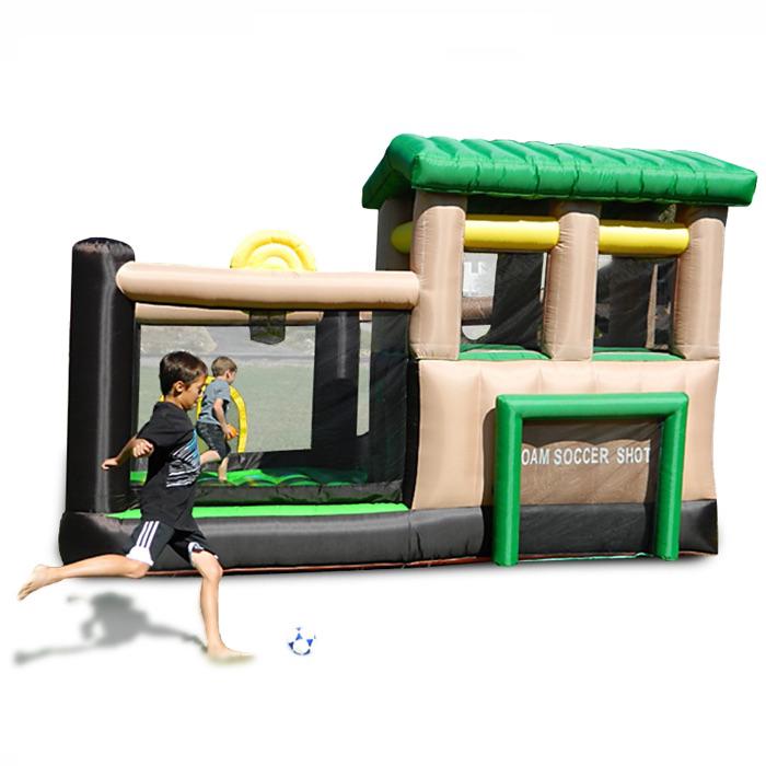 Island Hopper Fort All Sport Bounce House side view showing the lookout tower, basketball hoop, and soccer goal